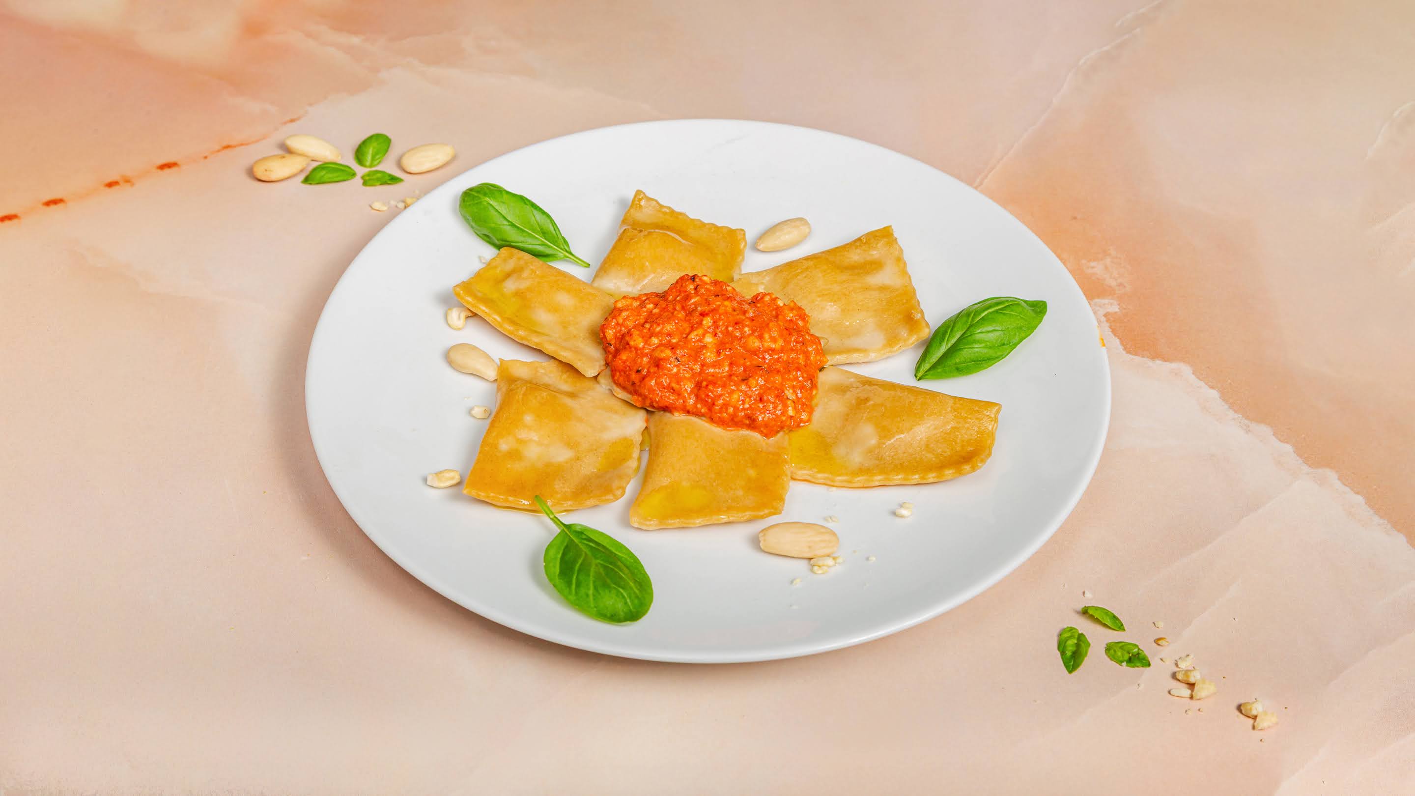 Cashew Ricotta, Truffle & Lemon Ravioli with Roasted Pepper Pesto